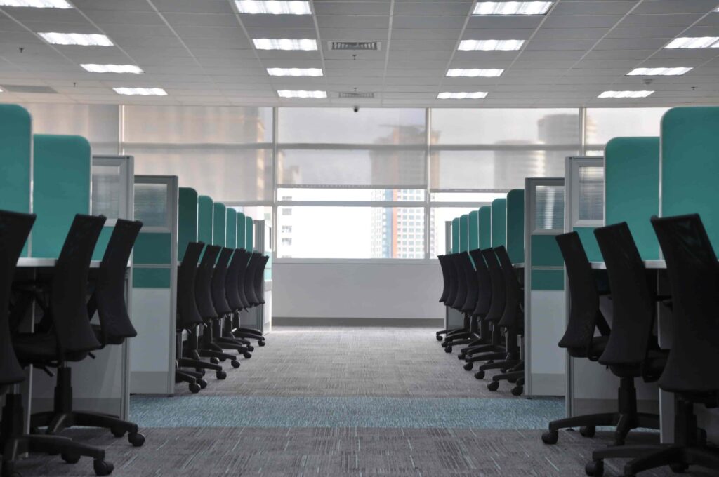 A row of office cubicles to illustrate a post about coming up with green team ideas.